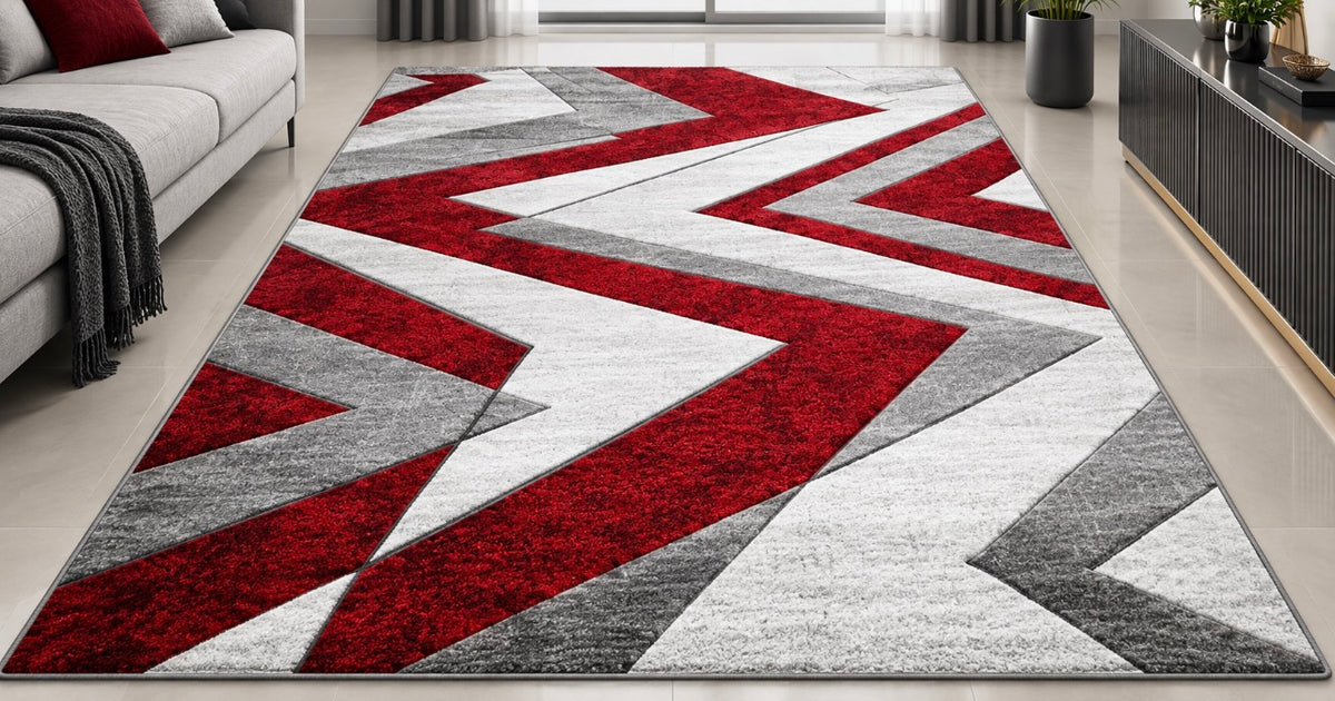 Grey, black, white and blush pink geometric Turkish rug in a living room