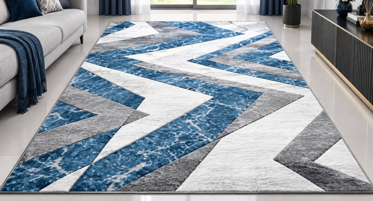 Blue, white and grey geometric Turkish rug in a living room